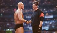 'Stone Cold' shaking hands with Mr. McMahon